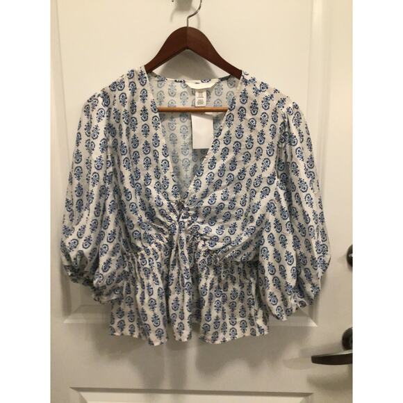 H&M Tops - H & M white and floral pattern